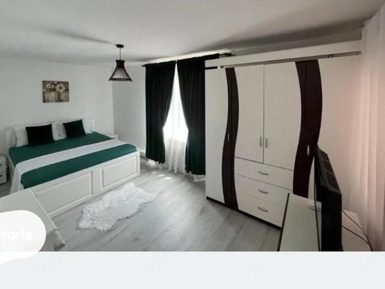 Casă cu 4 camere cu Teren 1128 Mp în 1 Mai