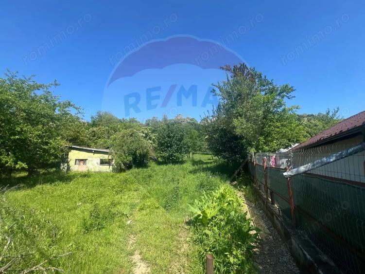 Casă cu Teren 1000 Mp în Periferie
