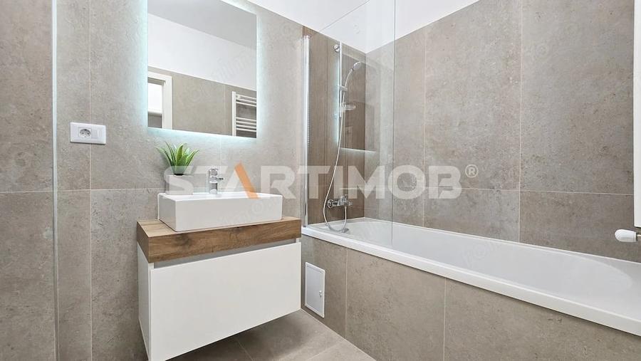 Apartament cu 2 camere decomandat în Tractorul