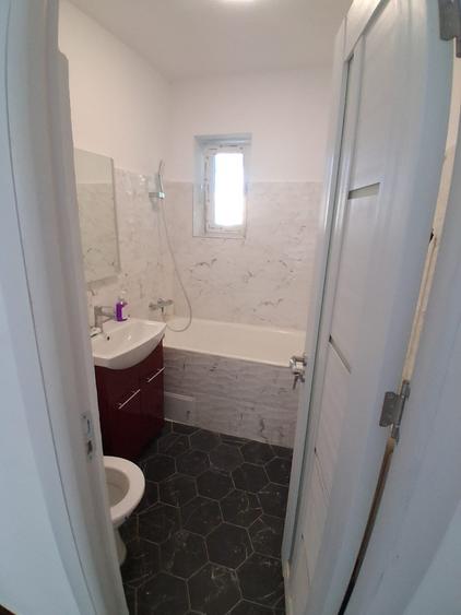 Apartament cu 2 camere semidecomandat în Podu Roș