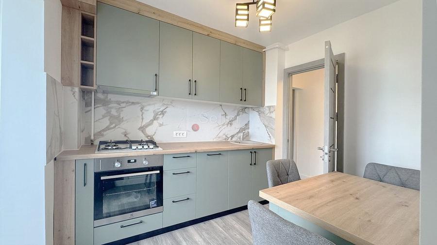 Apartament cu 2 camere decomandat, mobilat în Tractorul
