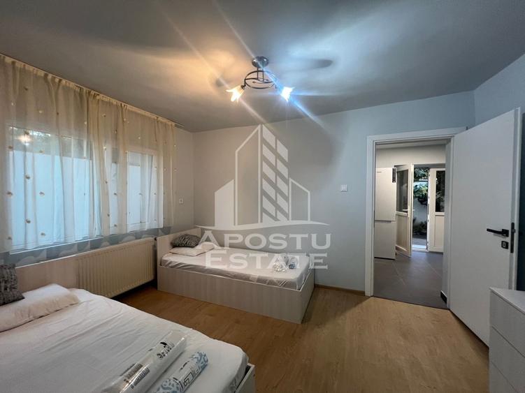 Apartament cu 2 camere semidecomandat, mobilat în Ghiroda