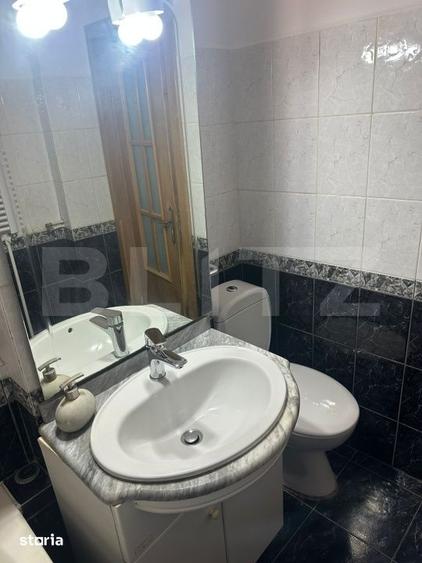 Apartament cu 4 camere semidecomandat în Calea București