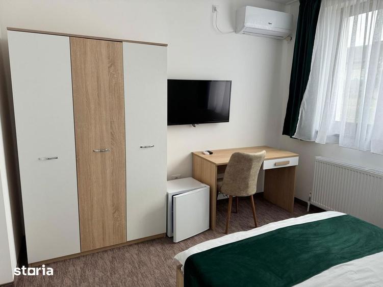 Casă cu 9 camere cu Teren 500 Mp în Sânmartin
