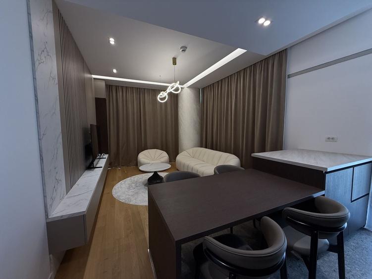 Apartament cu 3 camere semidecomandat, mobilat în Nord