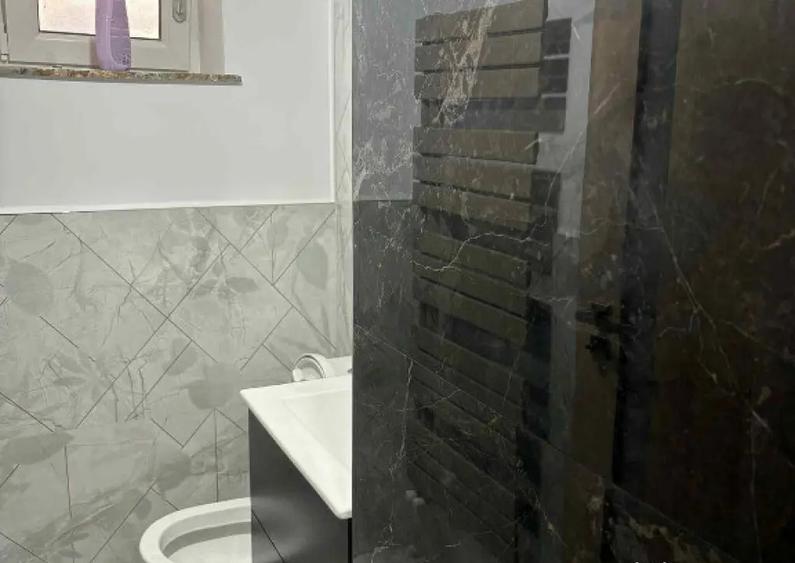 Apartament cu 3 camere decomandat în Calea București