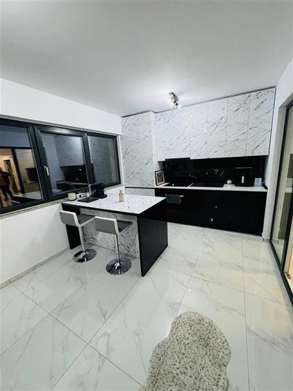 Apartament cu 2 camere semidecomandat, mobilat în Calea București