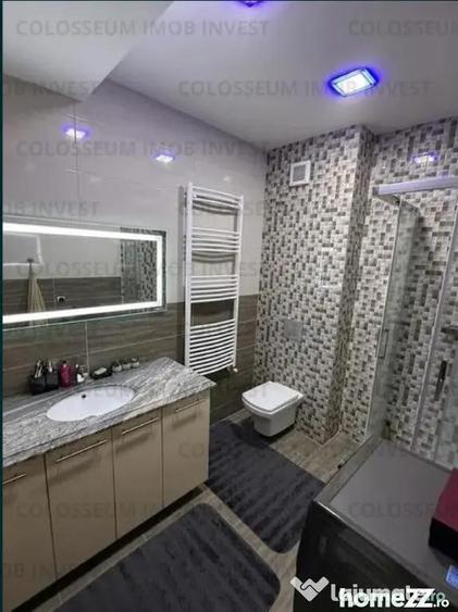 Apartament cu 3 camere decomandat în Tractorul