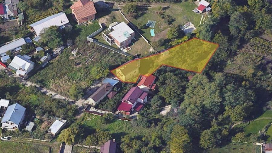 Casă individuală cu 5 camere cu Teren 1000 Mp în Central