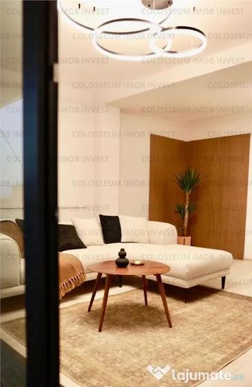 Apartament cu 3 camere decomandat în Tractorul