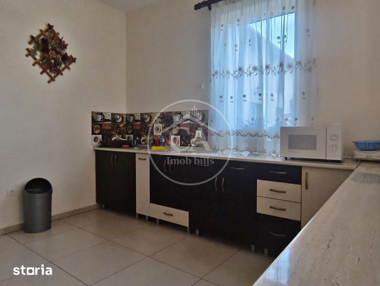 Casă cu Teren 1000 Mp în Sânmartin