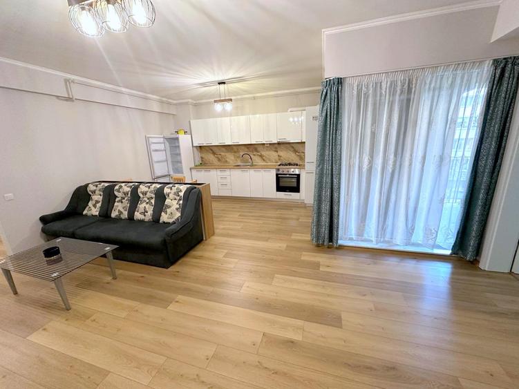 Apartament cu 2 camere semidecomandat, mobilat în Central