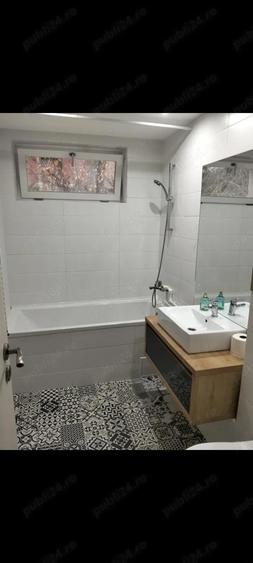 Apartament cu 3 camere semidecomandat în Nicolae Titulescu