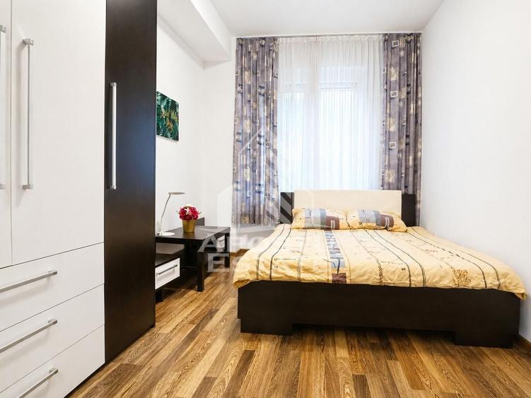 Apartament cu 2 camere semidecomandat, mobilat în UTA
