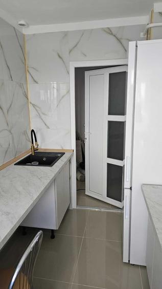 Apartament cu 3 camere decomandat în Liteni