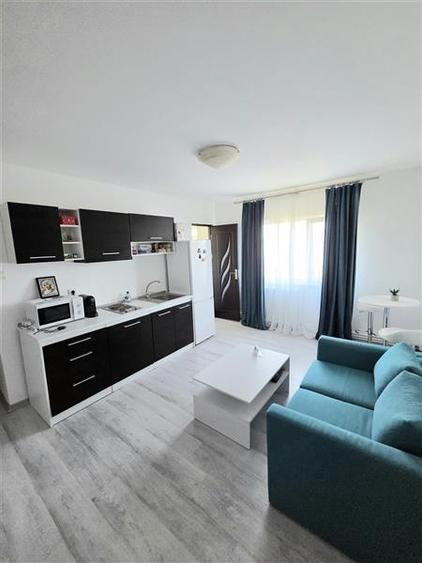 Apartament cu 3 camere semidecomandat, mobilat în Inel II