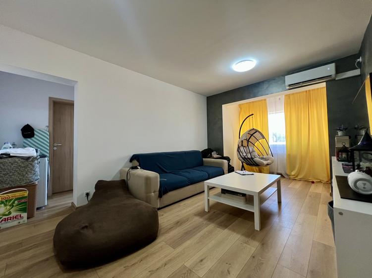 Apartament cu 3 camere semidecomandat, mobilat în UMT