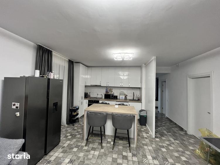 Casă cu 4 camere cu Teren 450 Mp în Tunari