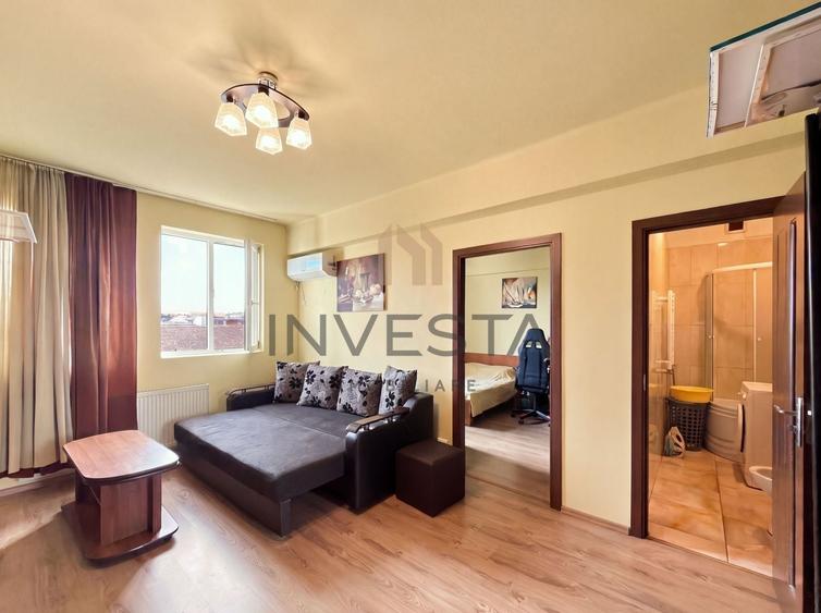 Apartament cu 2 camere semidecomandat, mobilat în Central