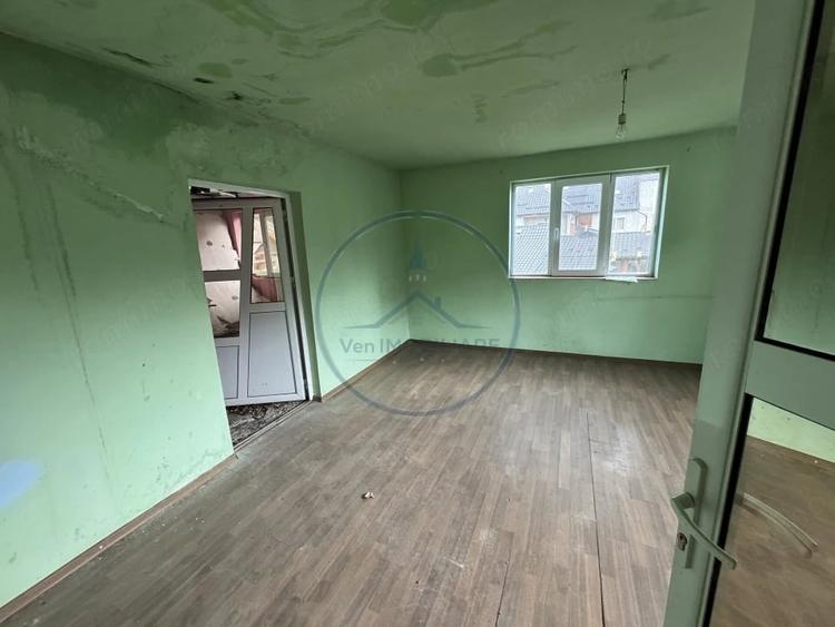 Casă cu Teren 970 Mp în Central