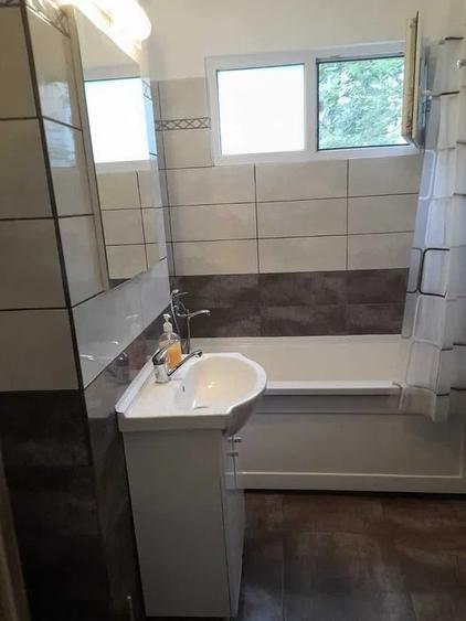 Apartament cu 2 camere semidecomandat, mobilat în Podul de Piatră