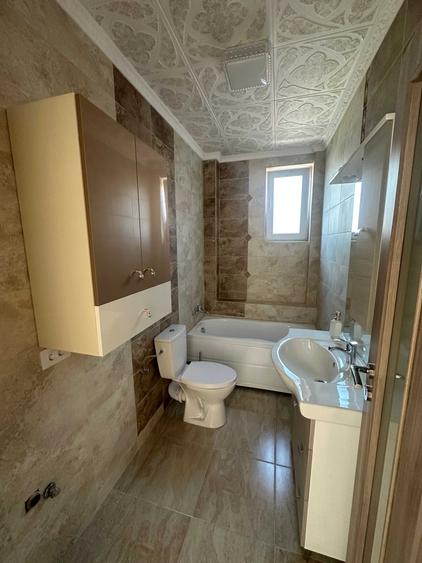 Apartament cu 3 camere decomandat în Bucium