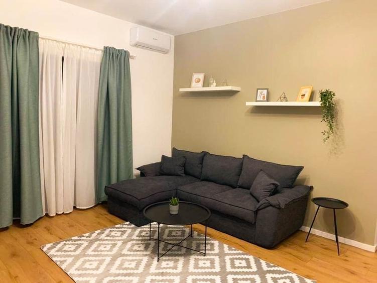 Apartament cu 3 camere semidecomandat, mobilat în Tunari