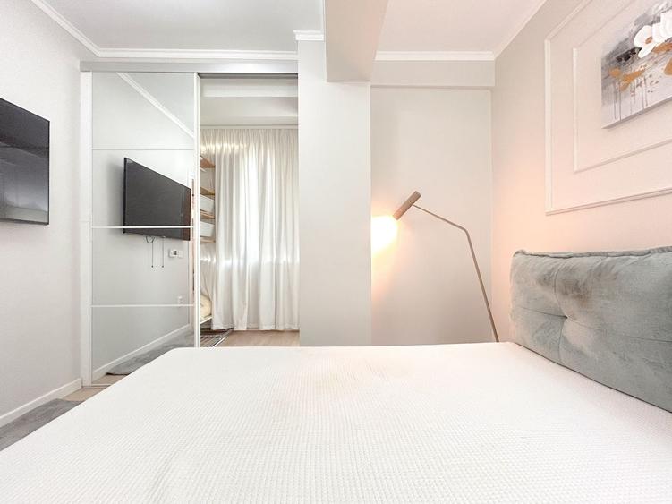 Apartament cu 2 camere semidecomandat, mobilat în Central
