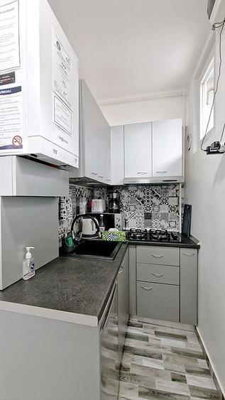Apartament cu 2 camere semidecomandat, mobilat în Centrul Istoric