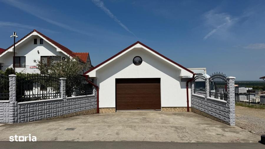 Casă cu 7 camere cu Teren 1080 Mp în Sânmartin
