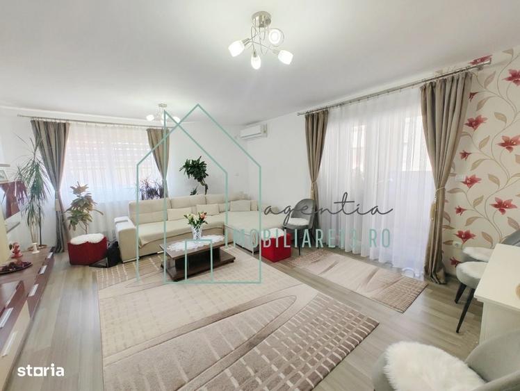 Apartament cu 3 camere decomandat în Petrești