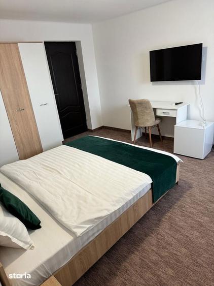 Casă cu 9 camere cu Teren 500 Mp în Sânmartin