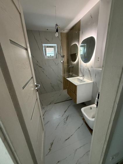 Apartament cu 3 camere decomandat, mobilat în Dâmbovița