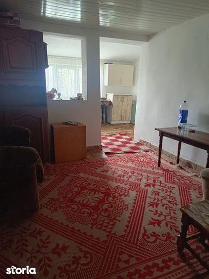 Casă cu 2 camere cu Teren 90 Mp în Bucu