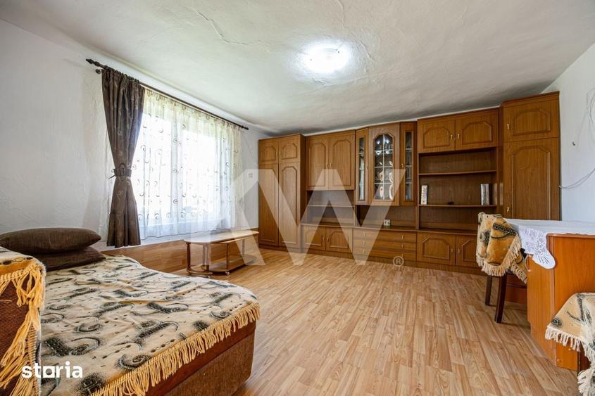 Casă cu 4 camere cu Teren 1045 Mp în Moieciu