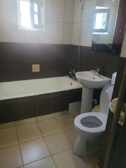 Apartament cu 3 camere decomandat în Romanești