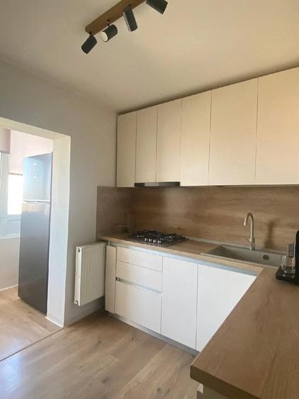 Apartament cu 3 camere decomandat în Sânmartin