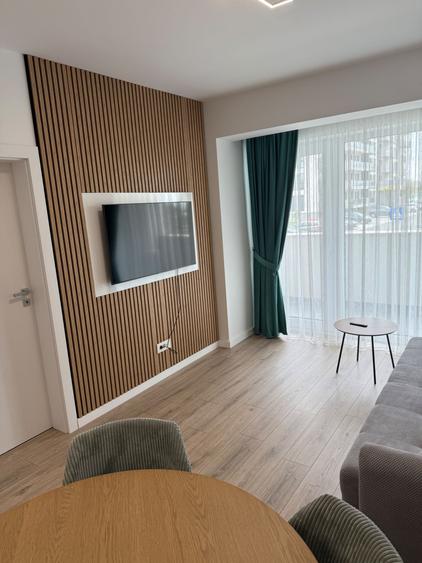 Apartament cu 2 camere semidecomandat, mobilat în Central