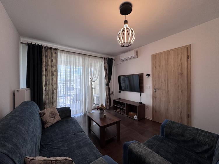 Apartament cu 2 camere decomandat, mobilat în Tractorul