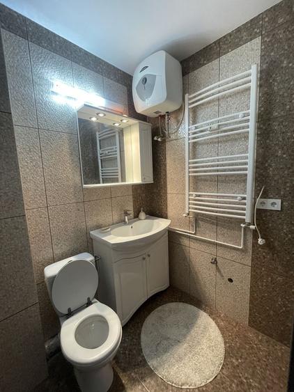 Apartament cu 2 camere semidecomandat, mobilat în Central