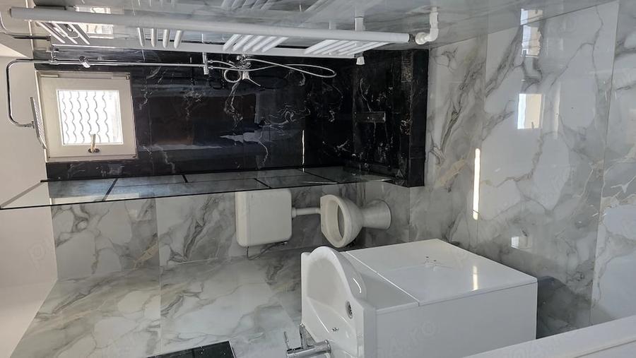 Apartament cu 4 camere semidecomandat în Central