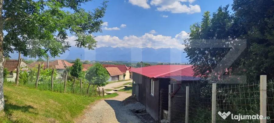 Casă cu 4 camere cu Teren 6500 Mp în Feldioara