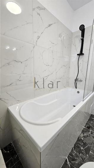 Apartament cu 3 camere semidecomandat, mobilat în Baciu