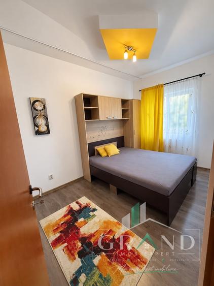 Apartament cu 3 camere semidecomandat, mobilat în Baciu