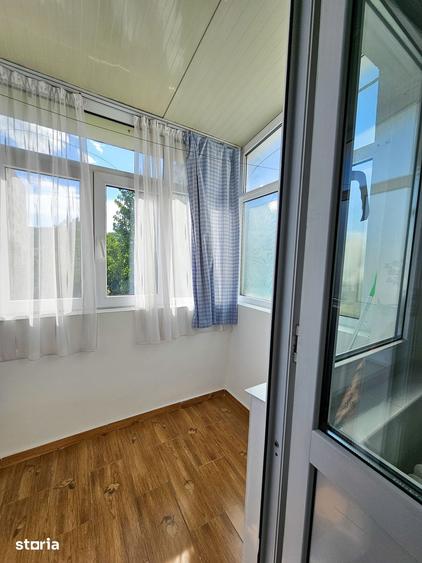 Apartament cu 2 camere semidecomandat în Podu Roș