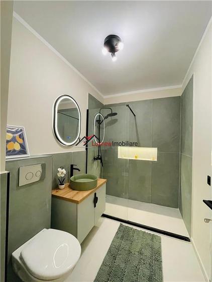 Apartament cu 2 camere semidecomandat, mobilat în Florești