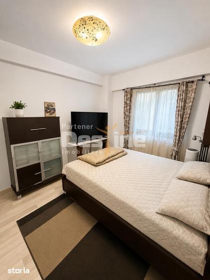 Apartament cu 3 camere decomandat, mobilat în Bucium — fotografia 3