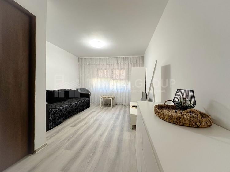 Apartament cu 3 camere decomandat în Tractorul