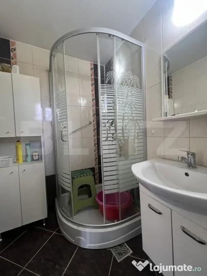 Casă cu 4 camere cu Teren 1000 Mp în Voiniceni