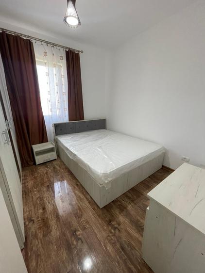 Apartament cu 3 camere semidecomandat, mobilat în Giroc